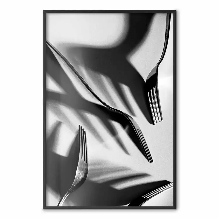 Cuatro tenedores: composición en blanco y negro con cubiertos retro