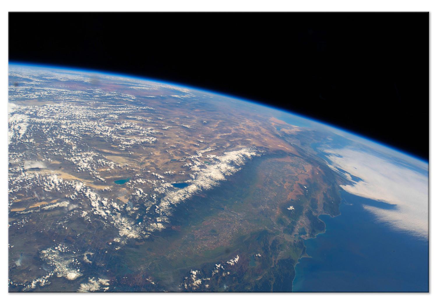 Cuadro decorativo Vista satelital del continente y océano - foto de Tierra desde espacio
