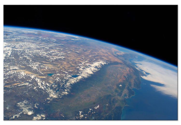 Vista satelital del continente y océano - foto de Tierra desde espacio