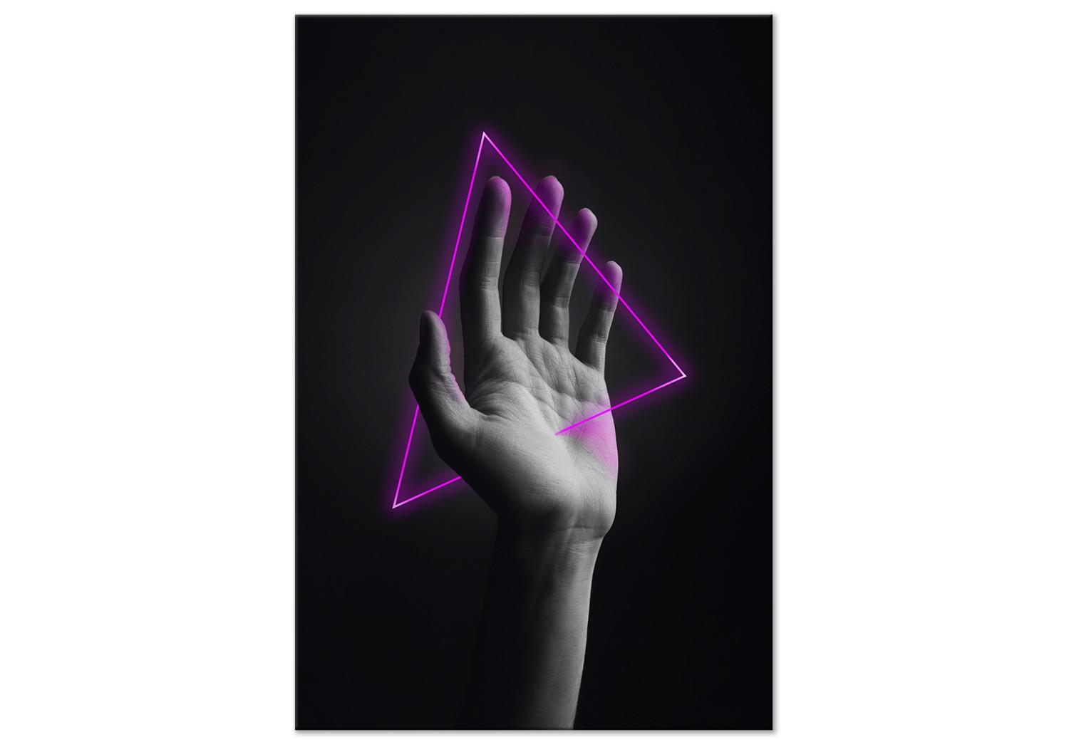 Cuadro Triángulo en la mano - figura de neón en la mano sobre un fondo negro