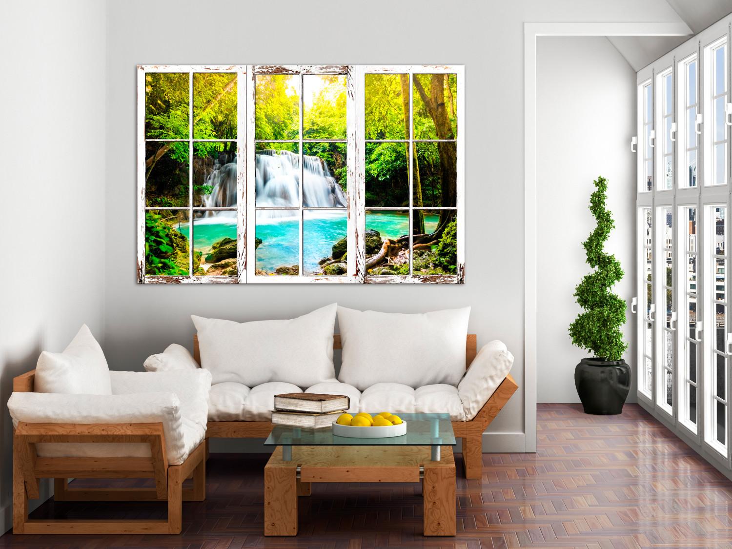 Cuadro decorativo Cascada vista desde una ventana cerrada - paisaje con agua y árboles