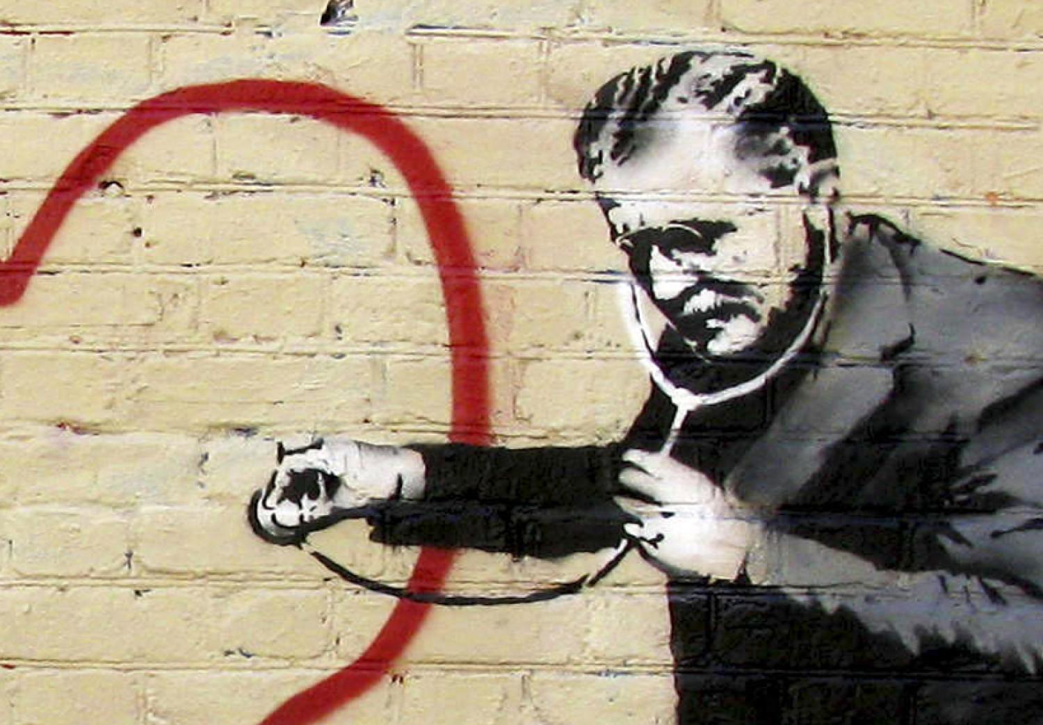 Cuadro decorativo Médico pacifista (Banksy) - en pared ladrillos