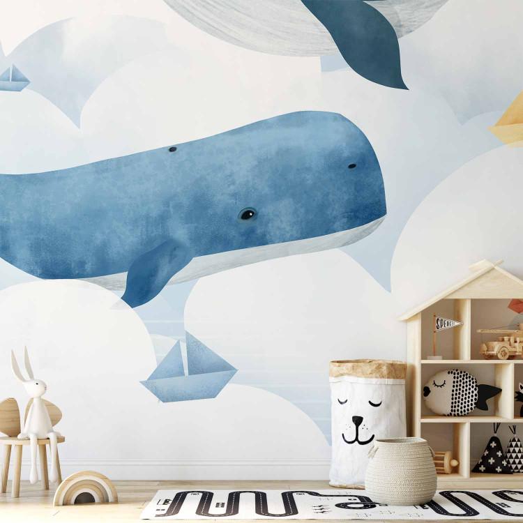 Ballenas nadando en las nubes - ilustración colorida con peces y barcos