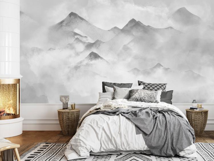 Fotomural Cara invernal de las montañas - un paisaje con nieve en tonos de gris