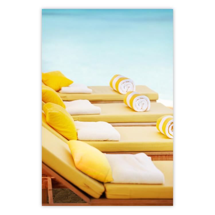 Summer at the Seaside - Yellow Sun Loungers on the Beach Lit by the Holiday Sun
