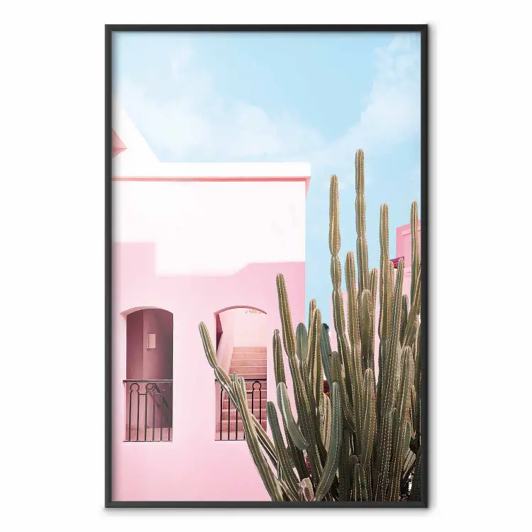 Cactus de Miami - casa de vacaciones contra el cielo azul y la luz