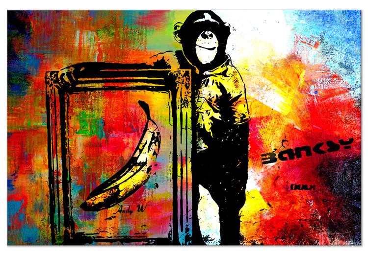 Monkey With a Banana - Banksy-Style Mural on a Colored Background
