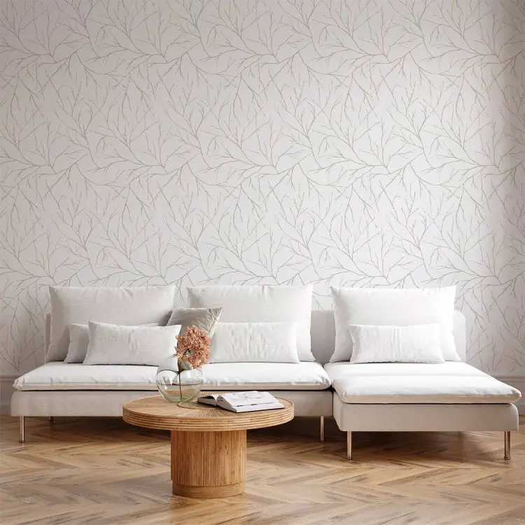 Minimalismo - ramas beige entrelazadas sobre fondo blanco