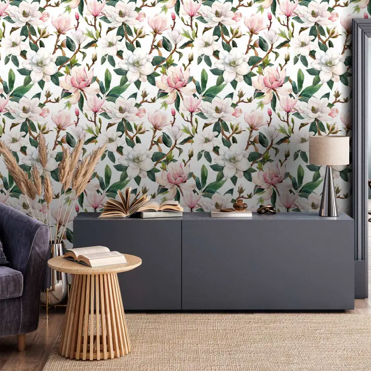 Hermosa magnolia - flores blancas y rosadas en ramas