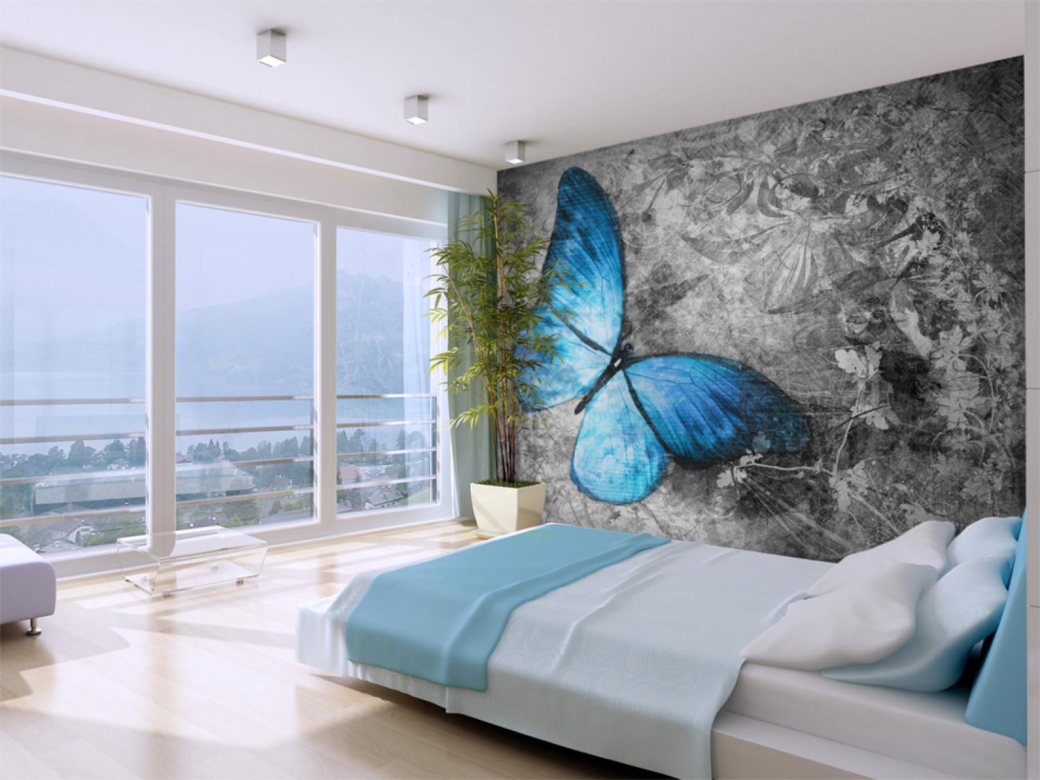 Fotomural decorativo Mundo de insectos - hermosa mariposa azul en patrón gris retro