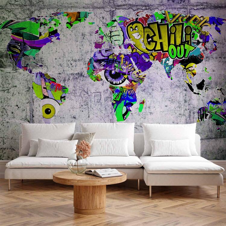 Mundo del grafiti - mapa colorido del mundo en fondo de cemento