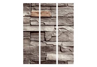 Biombo decorativo Muro del silencio - textura marrón de ladrillos de piedra