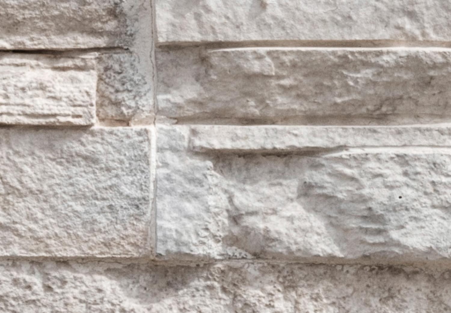 Fotomural a medida Maravilla - fondo beige con textura irregular de bloques de piedra