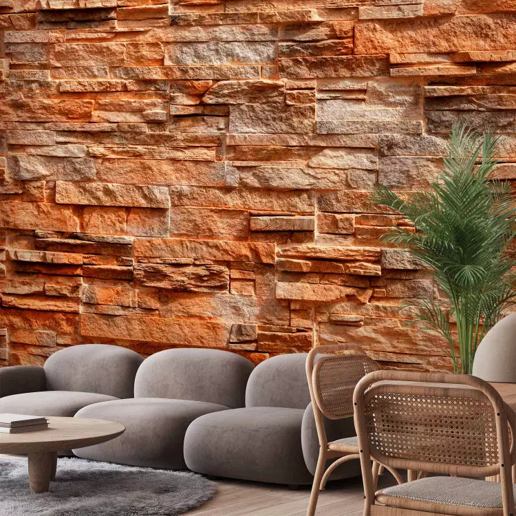 Fotomural decorativo Piedra naranja - fondo con textura irregular de bloques de piedra